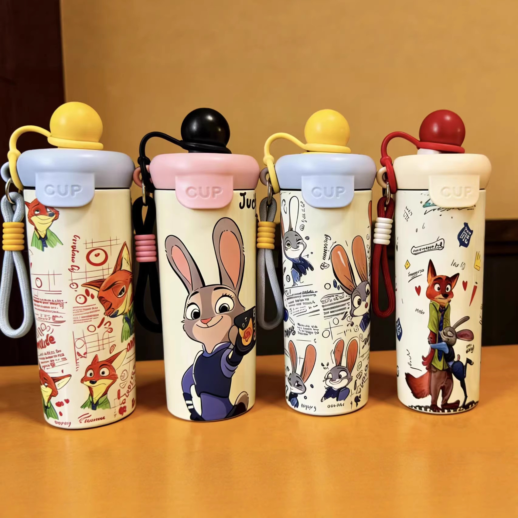 Laser engraving and UV printing decoration on stainless steel water bottles at B2B factory